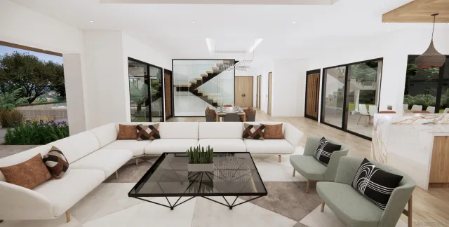 a living room with furniture rug and wooden floor