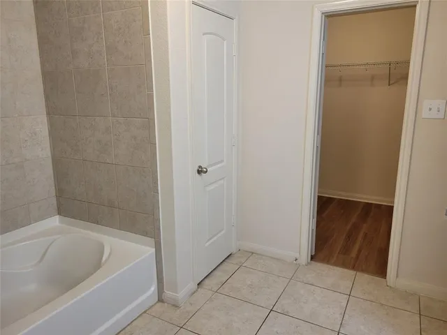 a bathroom with a bathtub