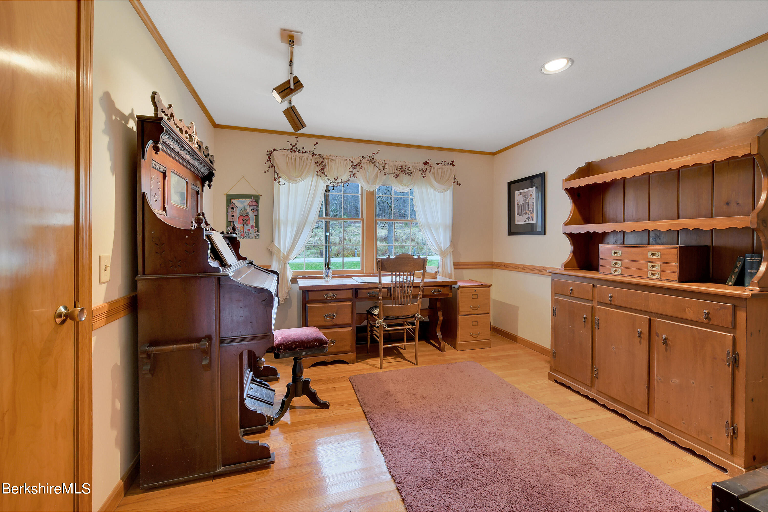 100 Town Hill Road Middlefield, MA 01011 - Photo 18 of 76 a kitchen with stainless steel appliances kitchen island granite countertop a refrigerator a sink dishwasher a dining table and chairs with wooden floor
