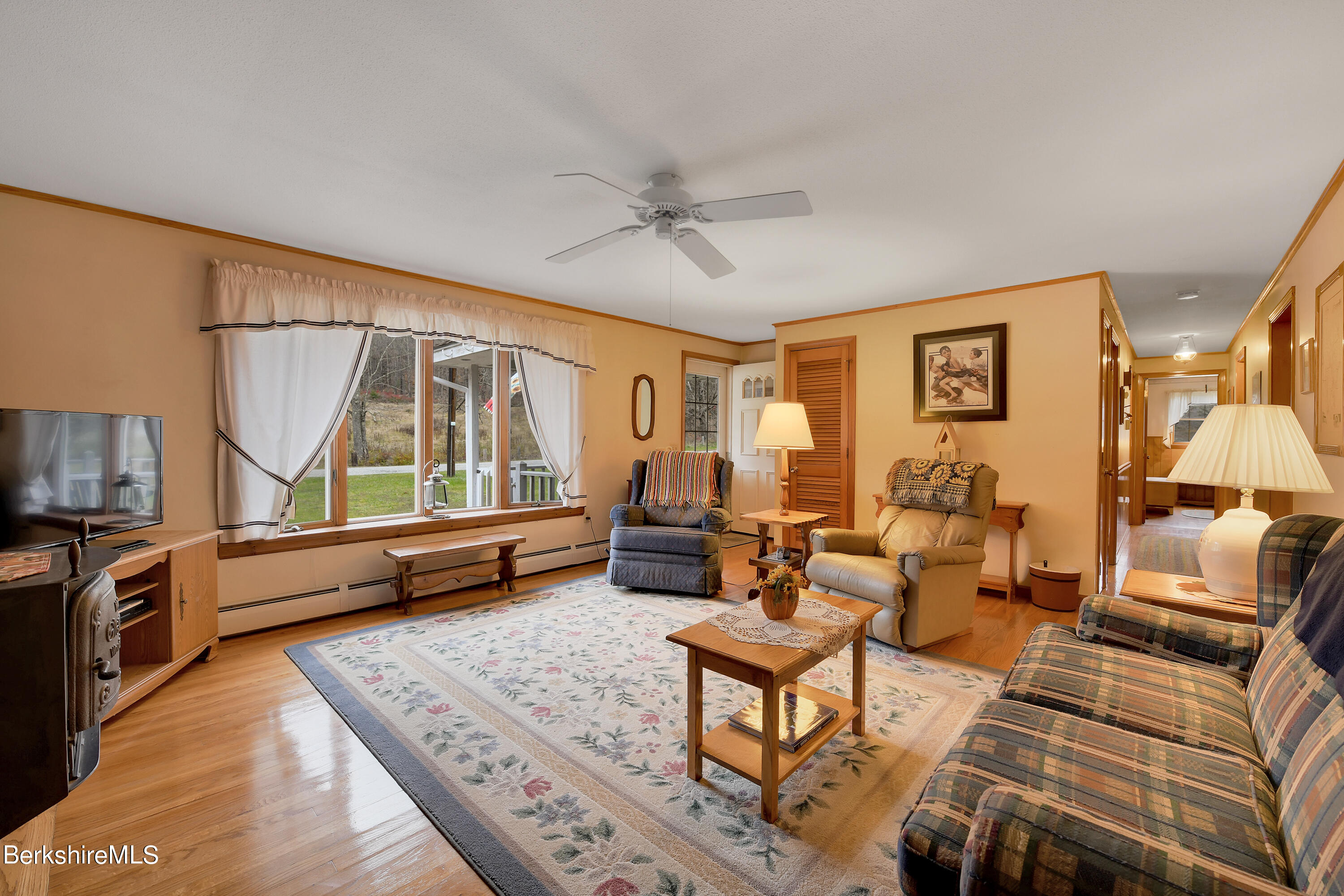 100 Town Hill Road Middlefield, MA 01011 - Photo 4 of 76 a living room with furniture and a large window