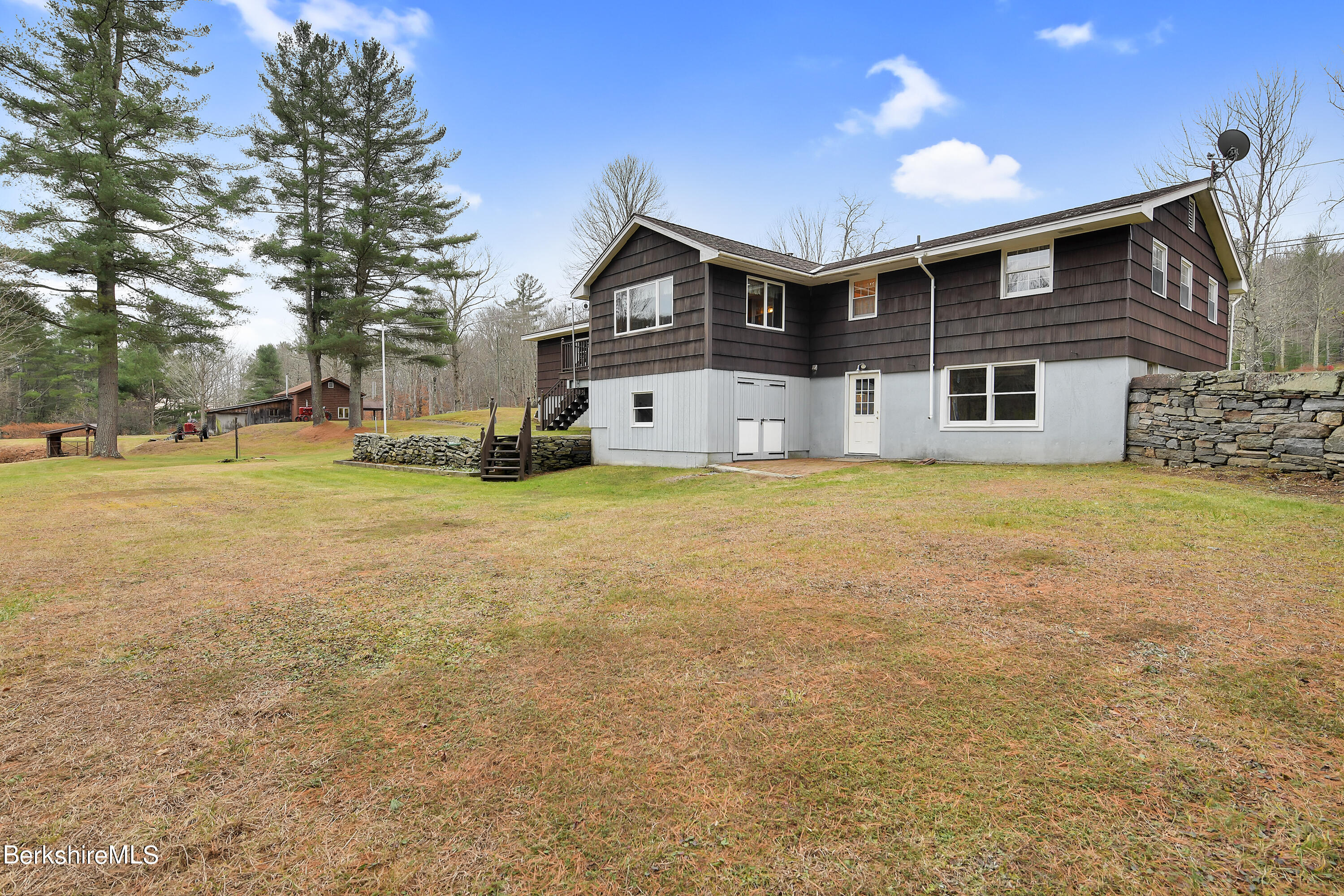 100 Town Hill Road Middlefield, MA 01011 - Photo 38 of 76 a house view with swimming pool in front of it