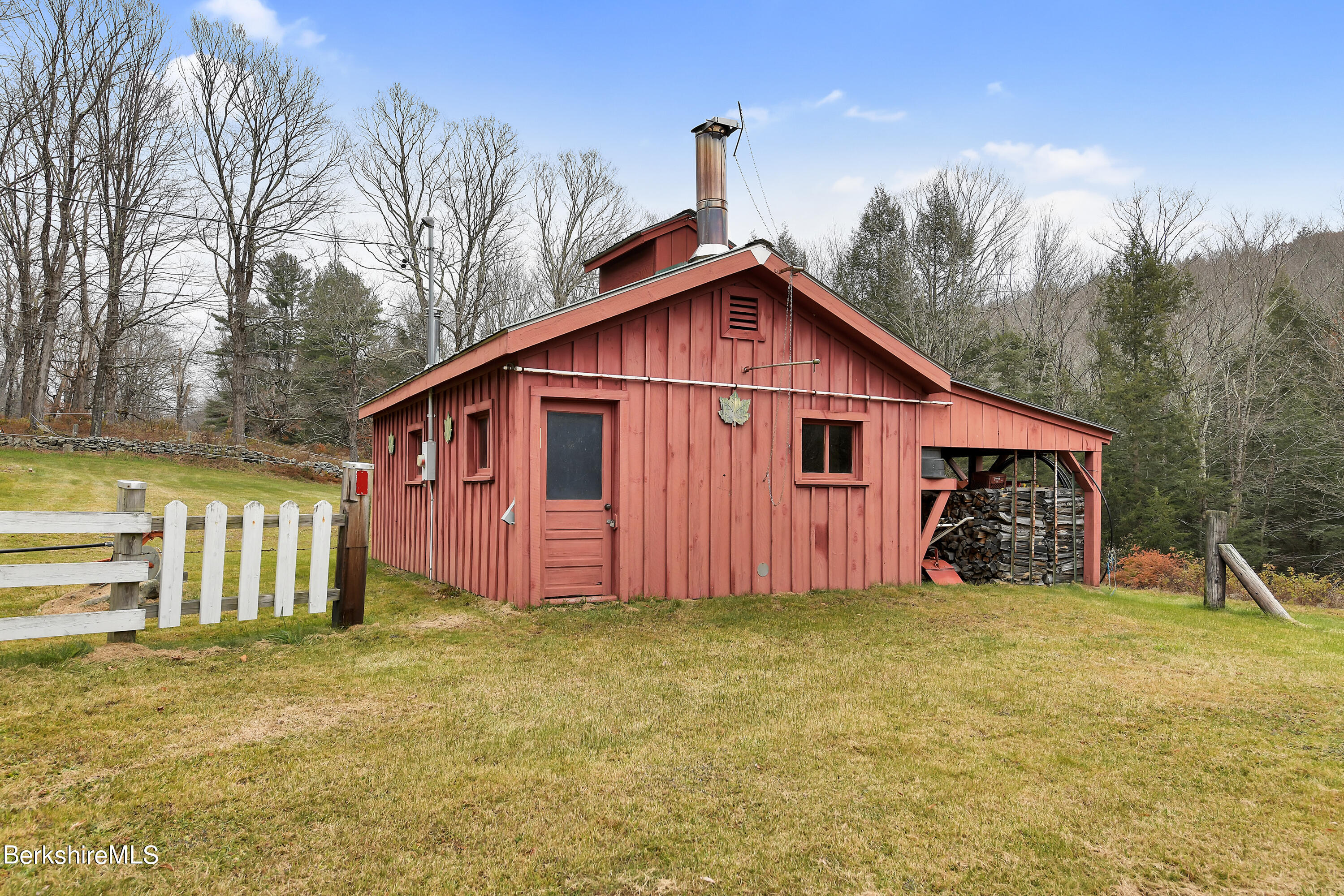 100 Town Hill Road Middlefield, MA 01011 - Photo 49 of 76 a view of a house with backyard and a tree