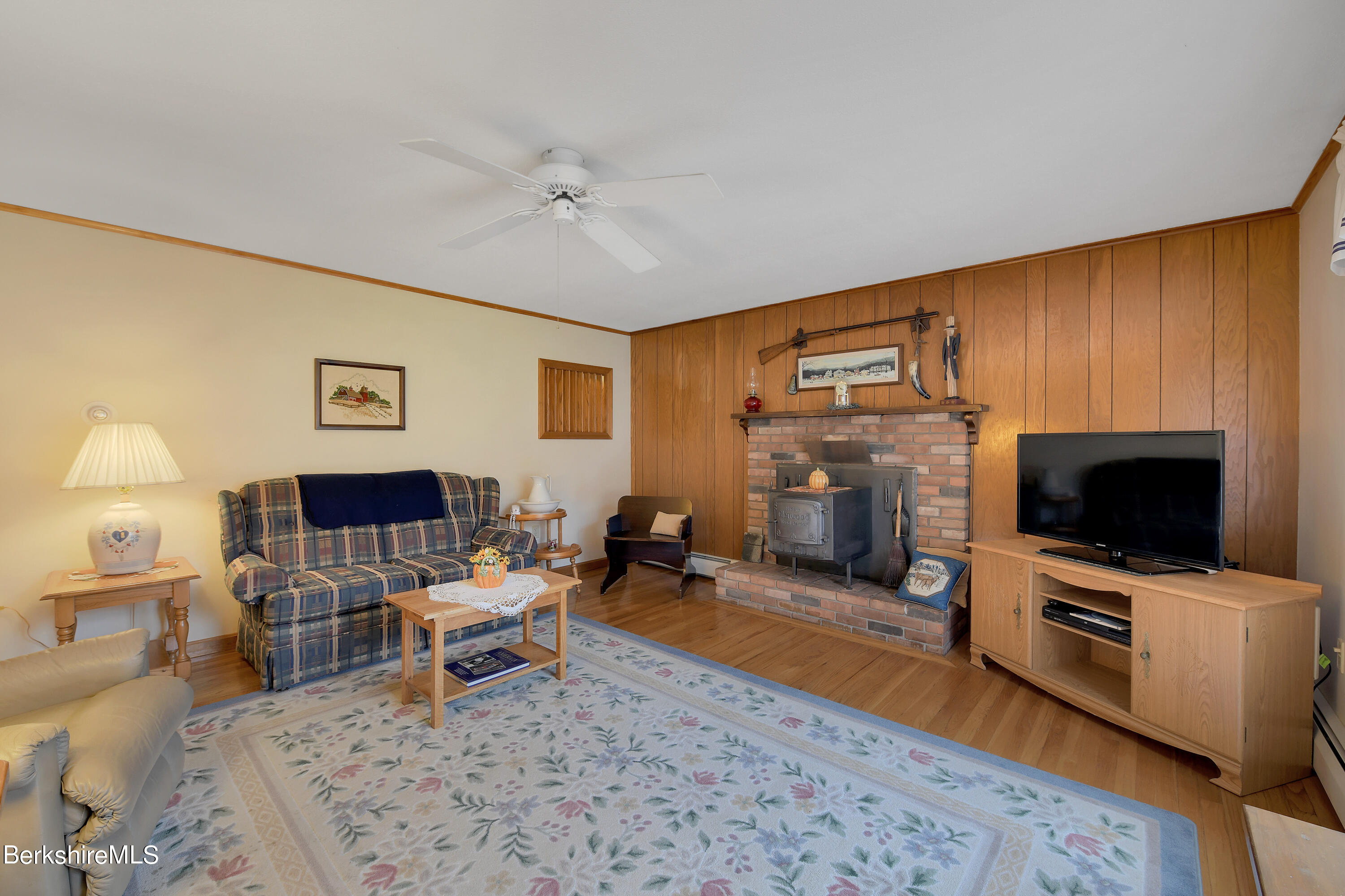 100 Town Hill Road Middlefield, MA 01011 - Photo 6 of 76 a living room with furniture and a flat screen tv