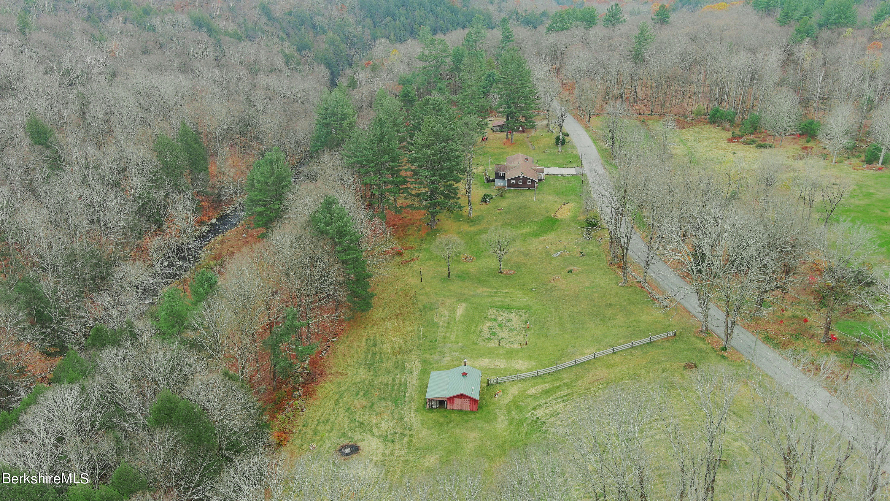 100 Town Hill Road Middlefield, MA 01011 - Photo 60 of 76 a aerial view of residential houses with outdoor space and trees