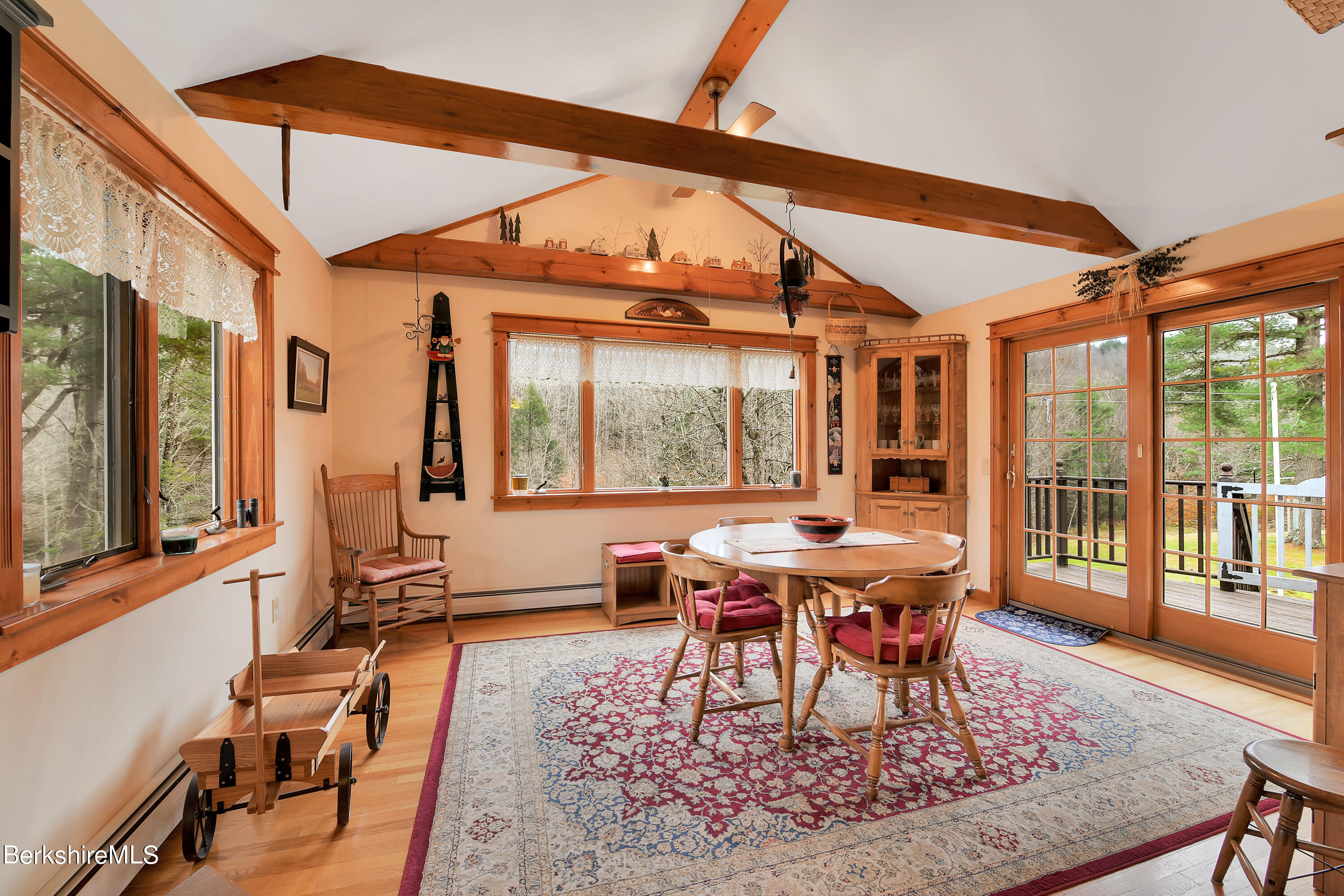 100 Town Hill Road Middlefield, MA 01011 - Photo 7 of 76 a living room with furniture a large window and wooden floor