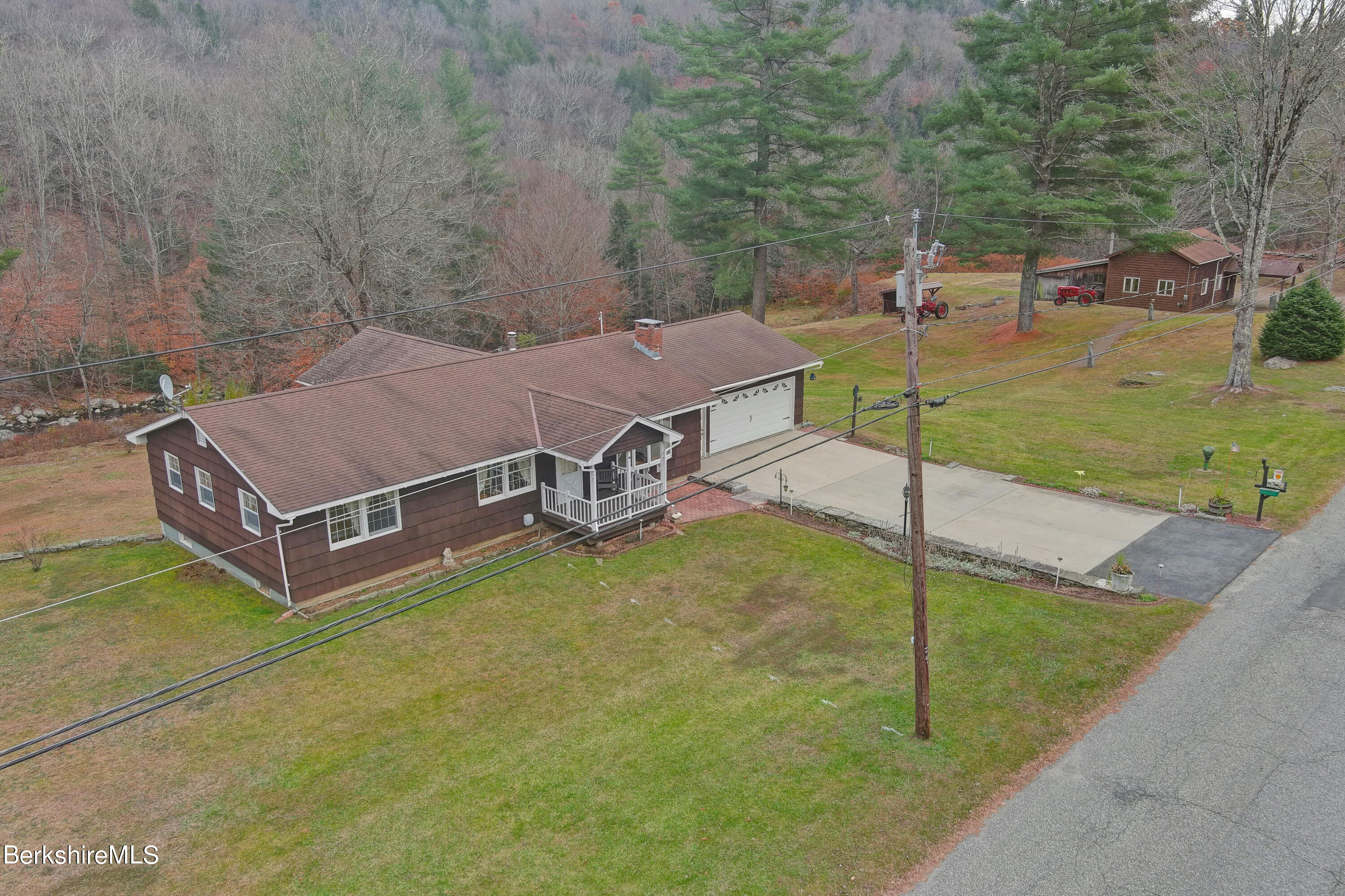 100 Town Hill Road Middlefield, MA 01011 - Photo 61 of 76 a view of a backyard with lawn chairs