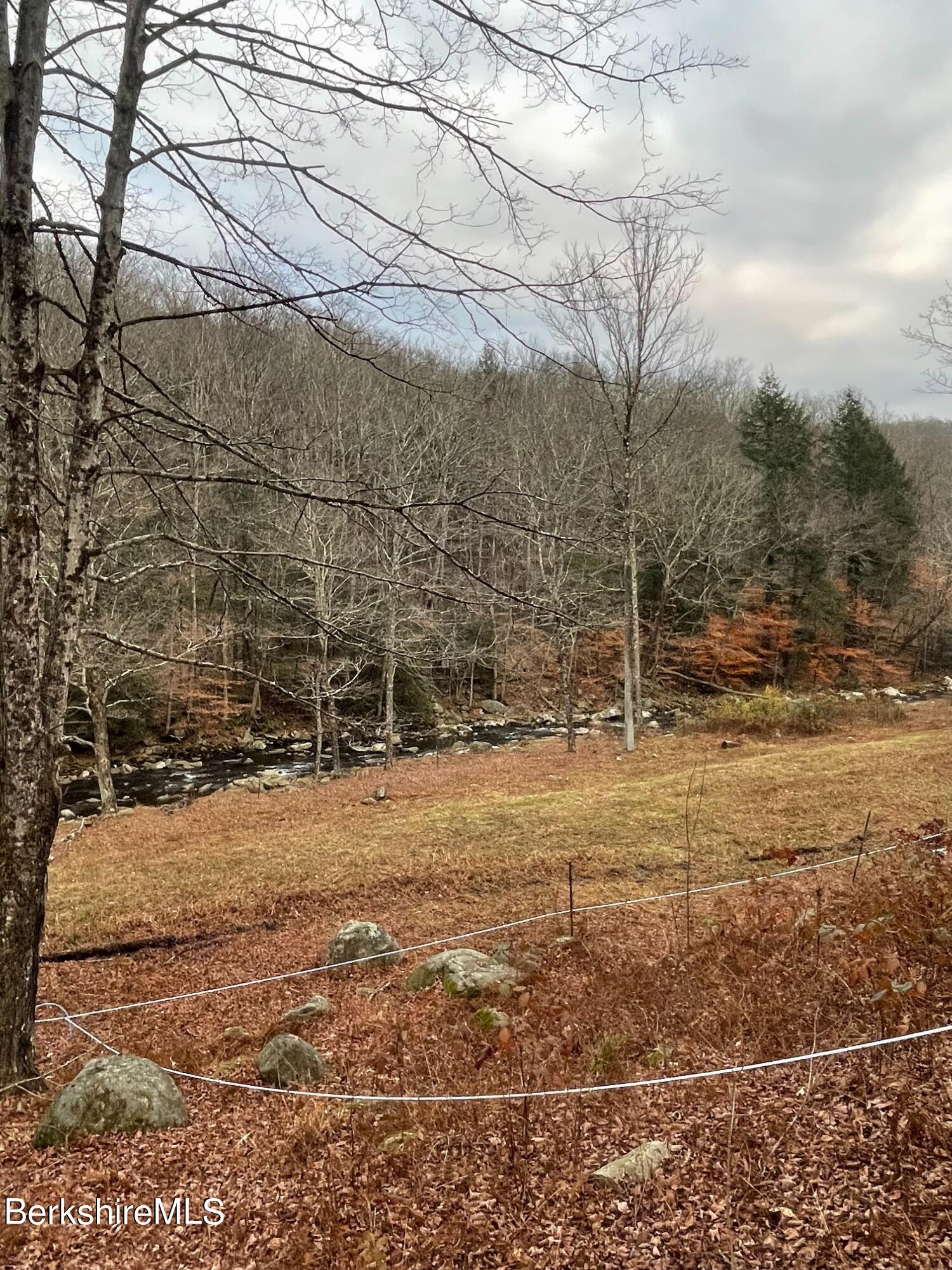 100 Town Hill Road Middlefield, MA 01011 - Photo 63 of 76 a view of a yard with wooden fence