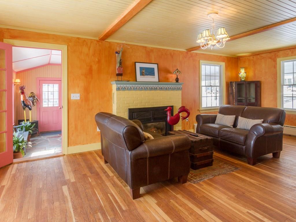 120 Phipps Point Road Woolwich, ME 04579 - Photo 8 of 35 Centered by a gas fireplace, the...