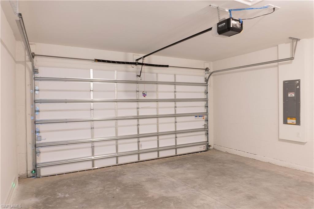 1050 Enbrook Loop Naples, FL 34114 - Photo 20 of 29 a view of a room with racks on the wall