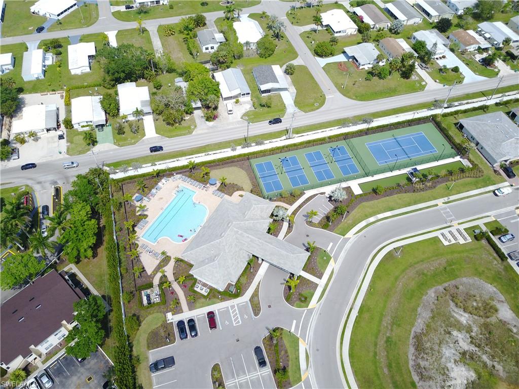 1050 Enbrook Loop Naples, FL 34114 - Photo 26 of 29 a bird view of a swimming pool