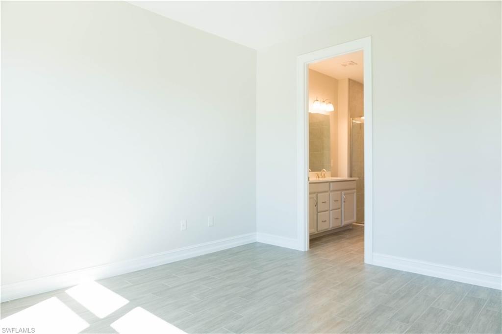 1050 Enbrook Loop Naples, FL 34114 - Photo 8 of 29 a view of an empty room