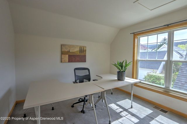 a view of a workspace with a window