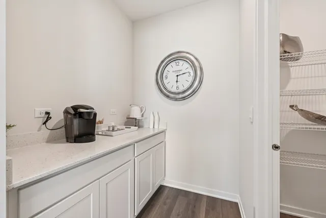 a bathroom with a toilet and a sink
