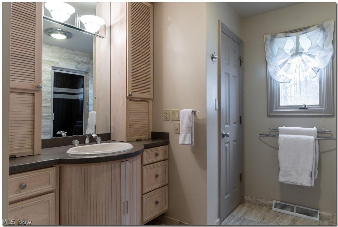 2797 Belgrave Road Cleveland, OH 44124 - Photo 24 of 34 The vanity provides ample bathroom storage.