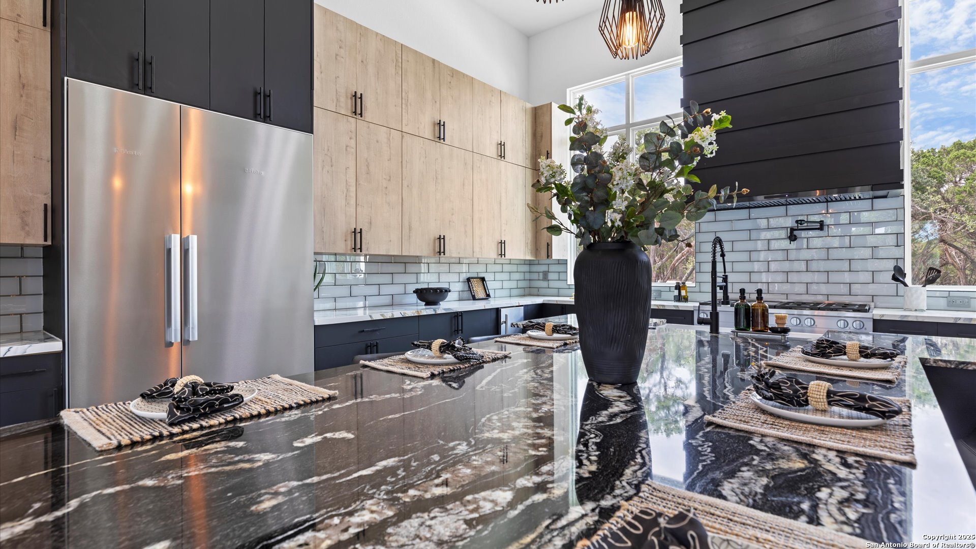 22327 Scenic Loop Road San Antonio, TX 78255 - Photo 15 of 59 a vase of flowers sitting on a table