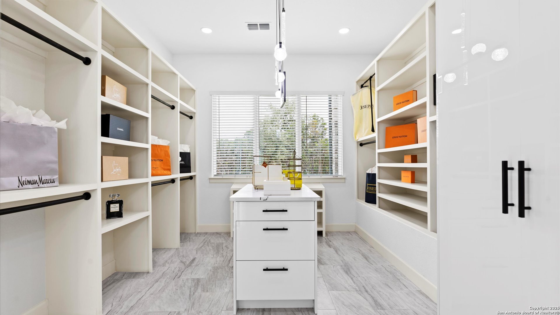 22327 Scenic Loop Road San Antonio, TX 78255 - Photo 30 of 59 a kitchen with a cabinets and white appliances