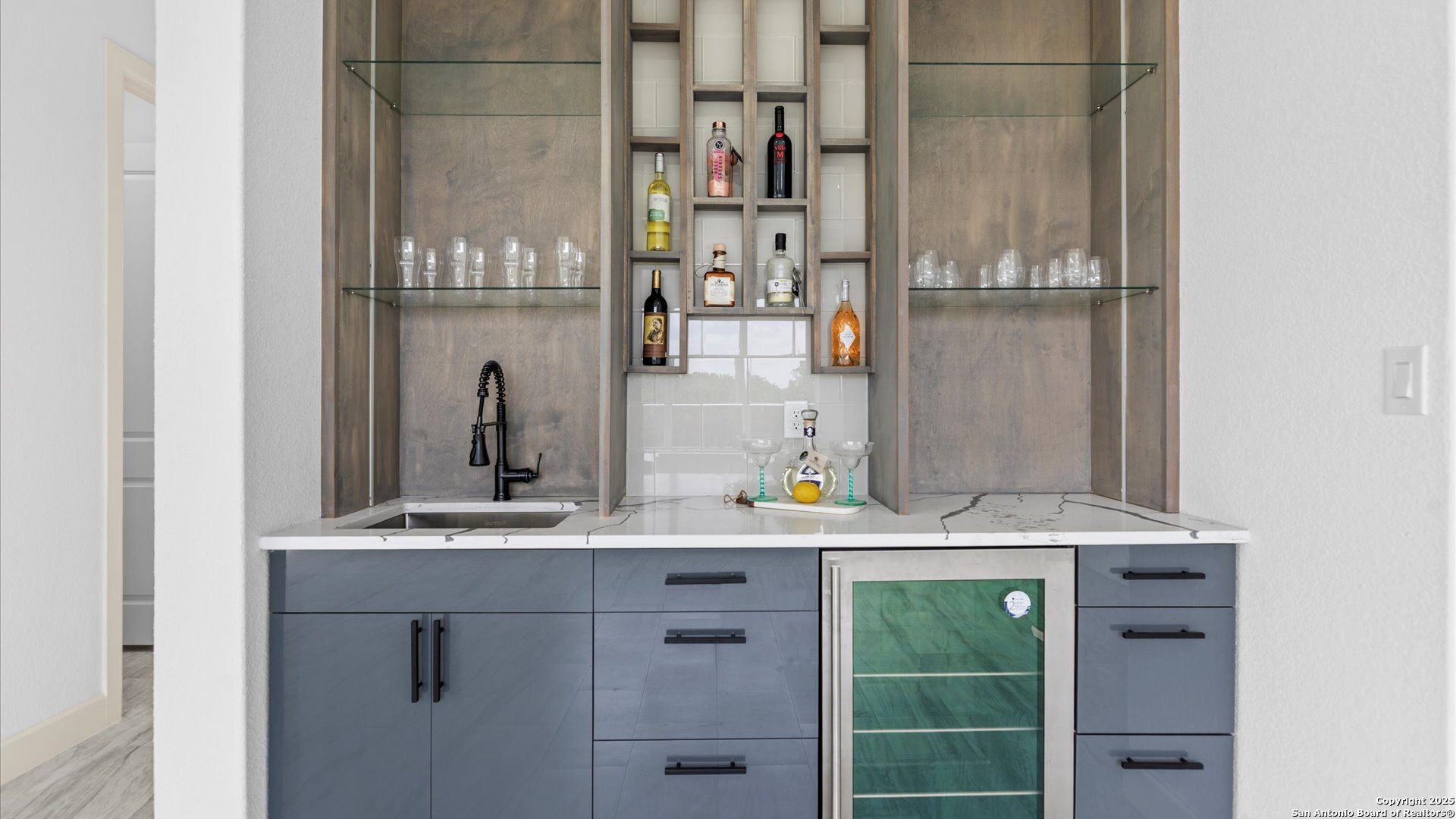 22327 Scenic Loop Road San Antonio, TX 78255 - Photo 46 of 59 a bathroom with a sink and a mirror