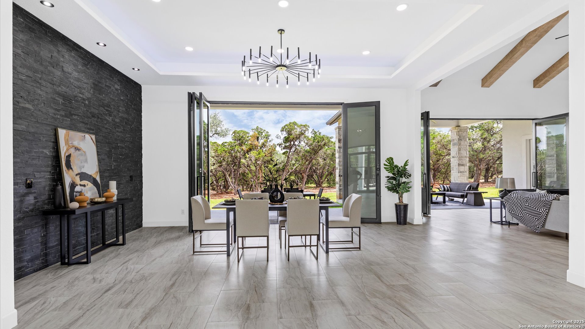 22327 Scenic Loop Road San Antonio, TX 78255 - Photo 10 of 59 a view of a livingroom with furniture window and wooden floor