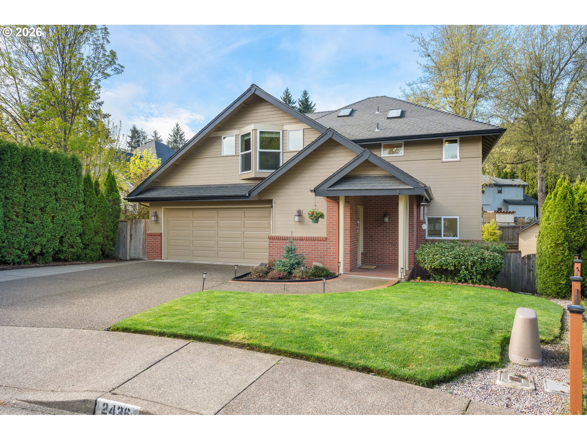 2436 Greiner Street Eugene, OR 97405 - Photo 2 of 45 a front view of a house with a yard and garage