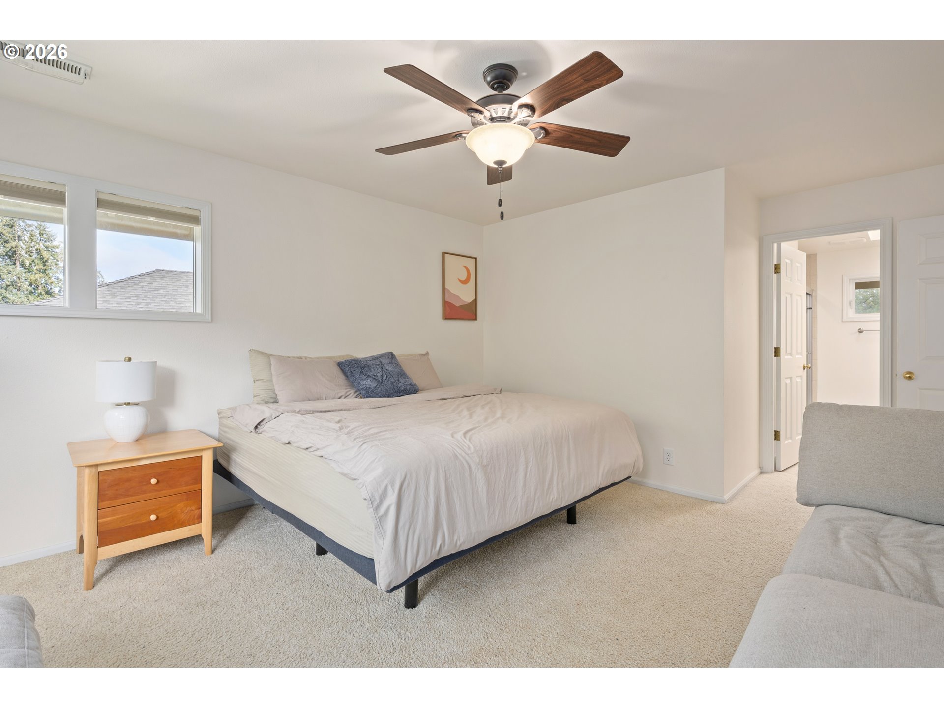 2436 Greiner Street Eugene, OR 97405 - Photo 22 of 45 a bedroom with a bed and a ceiling fan