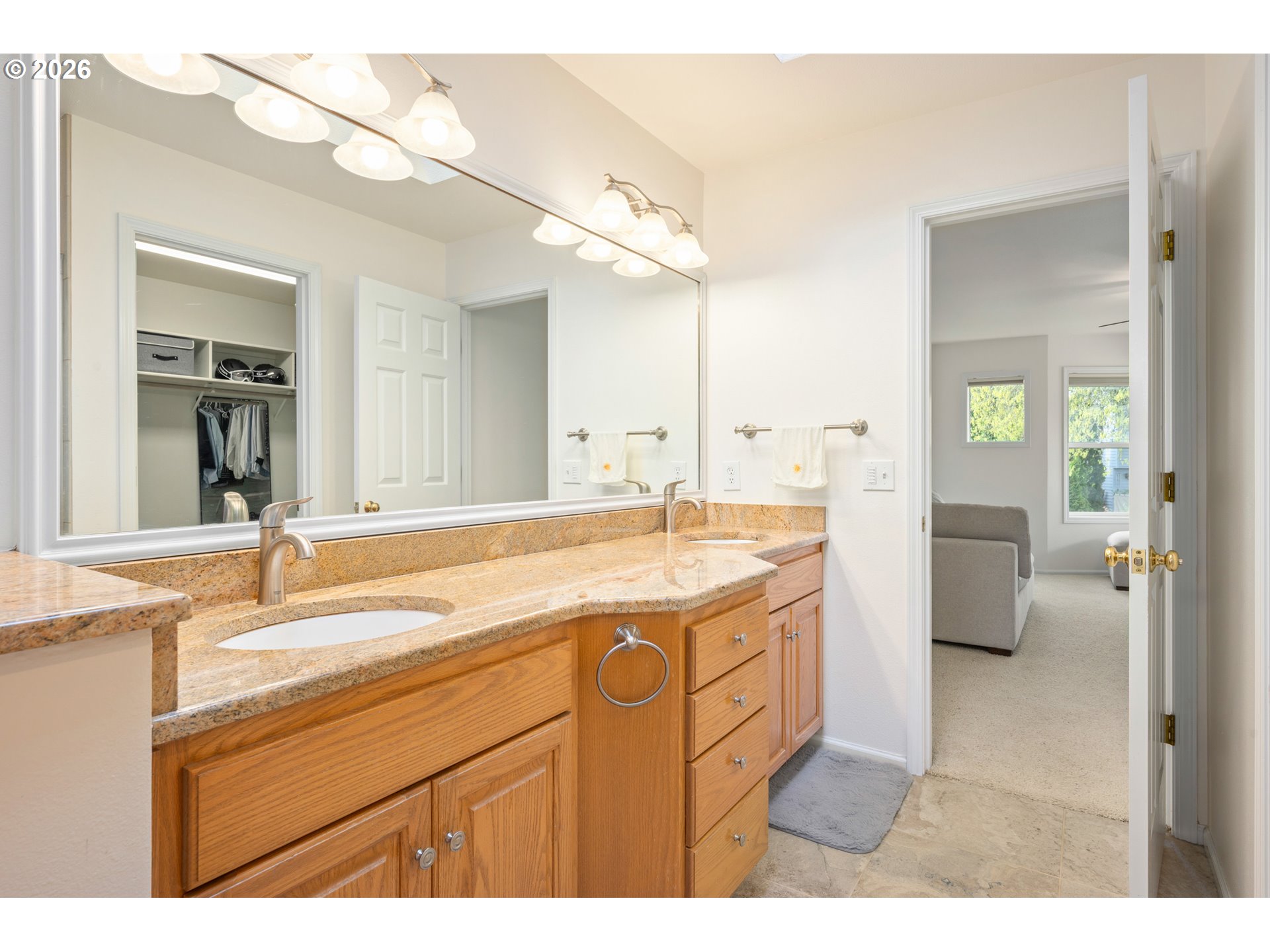 2436 Greiner Street Eugene, OR 97405 - Photo 25 of 45 a bathroom with a sink a mirror and a bathtub