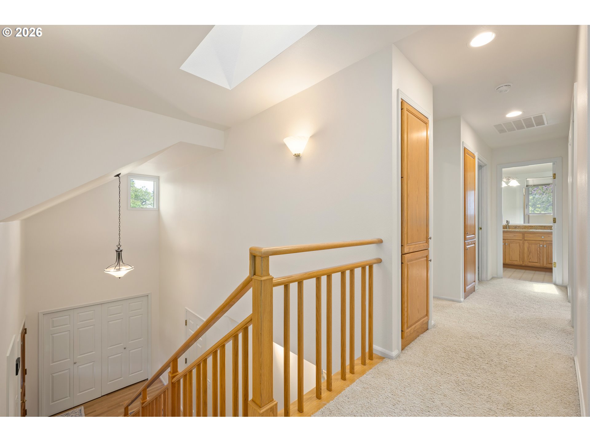 2436 Greiner Street Eugene, OR 97405 - Photo 27 of 45 a view of a hallway with wooden floor