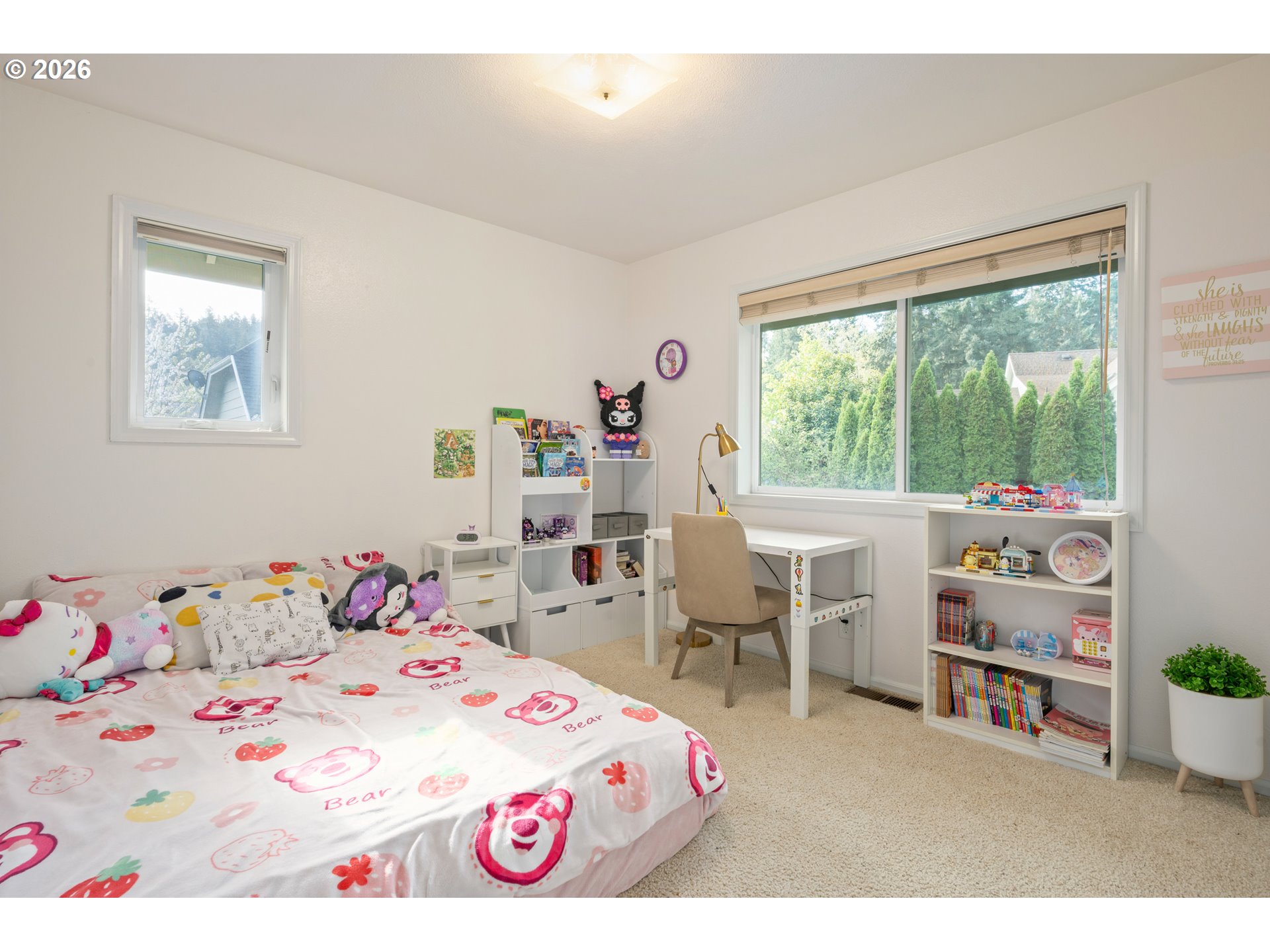 2436 Greiner Street Eugene, OR 97405 - Photo 28 of 45 a bedroom with a bed and a table