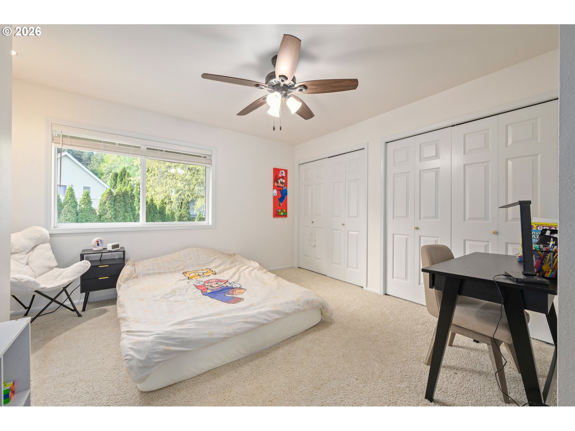 2436 Greiner Street Eugene, OR 97405 - Photo 29 of 45 a bedroom with a bed and a table