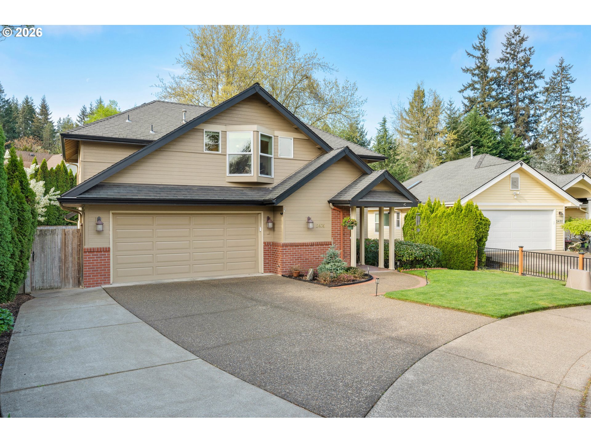2436 Greiner Street Eugene, OR 97405 - Photo 3 of 45 a front view of a house with a yard and garage