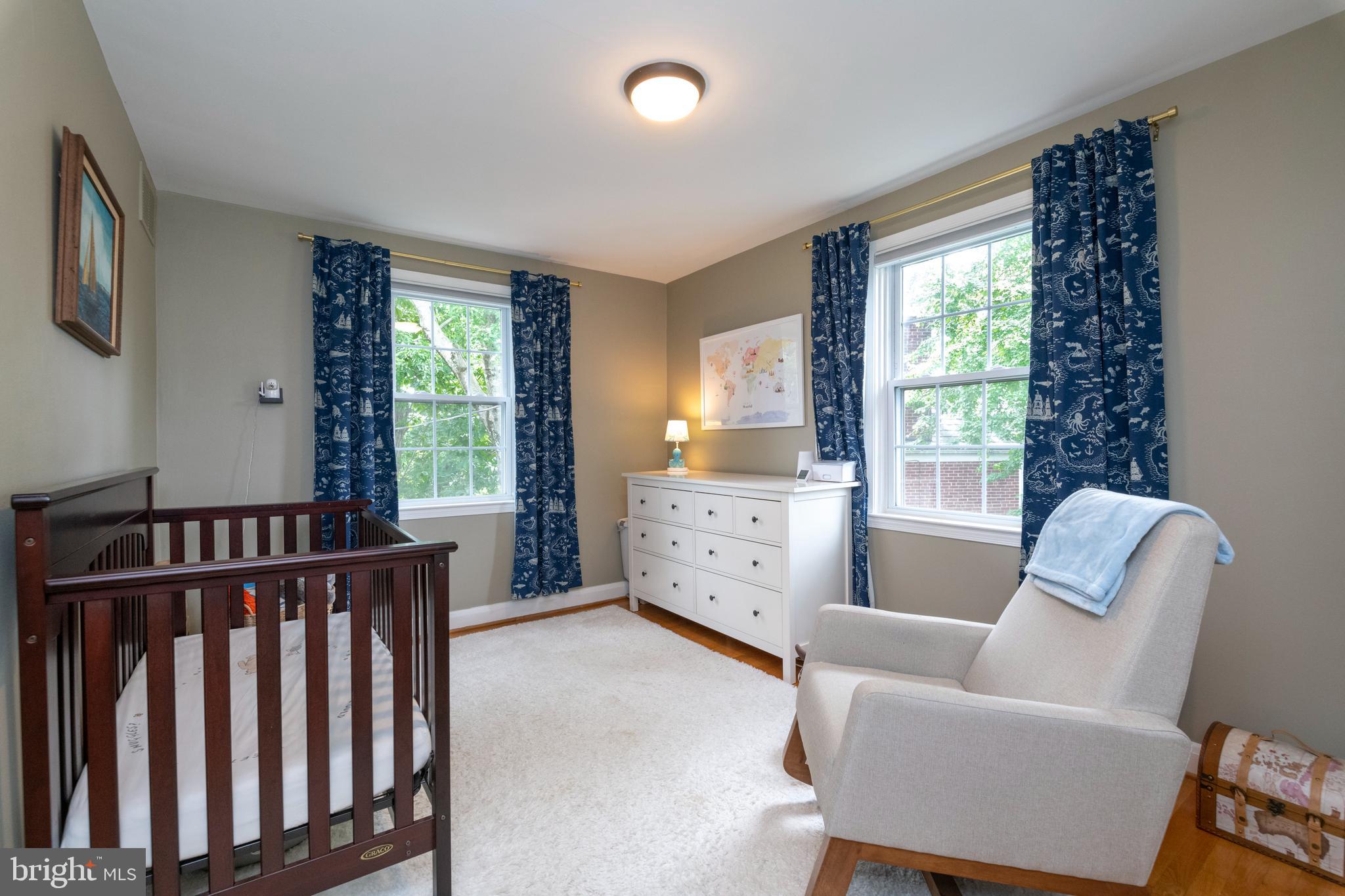 115 Brandon Road Baltimore, MD 21212 - Photo 23 of 39 a bedroom with furniture and windows