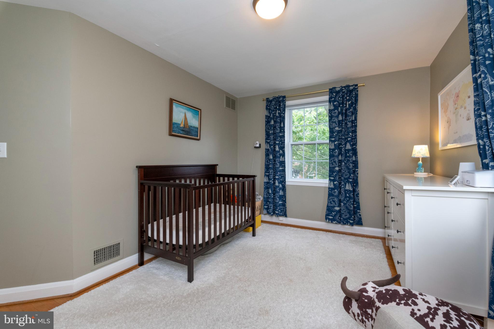 115 Brandon Road Baltimore, MD 21212 - Photo 24 of 39 a view of livingroom with furniture and windows