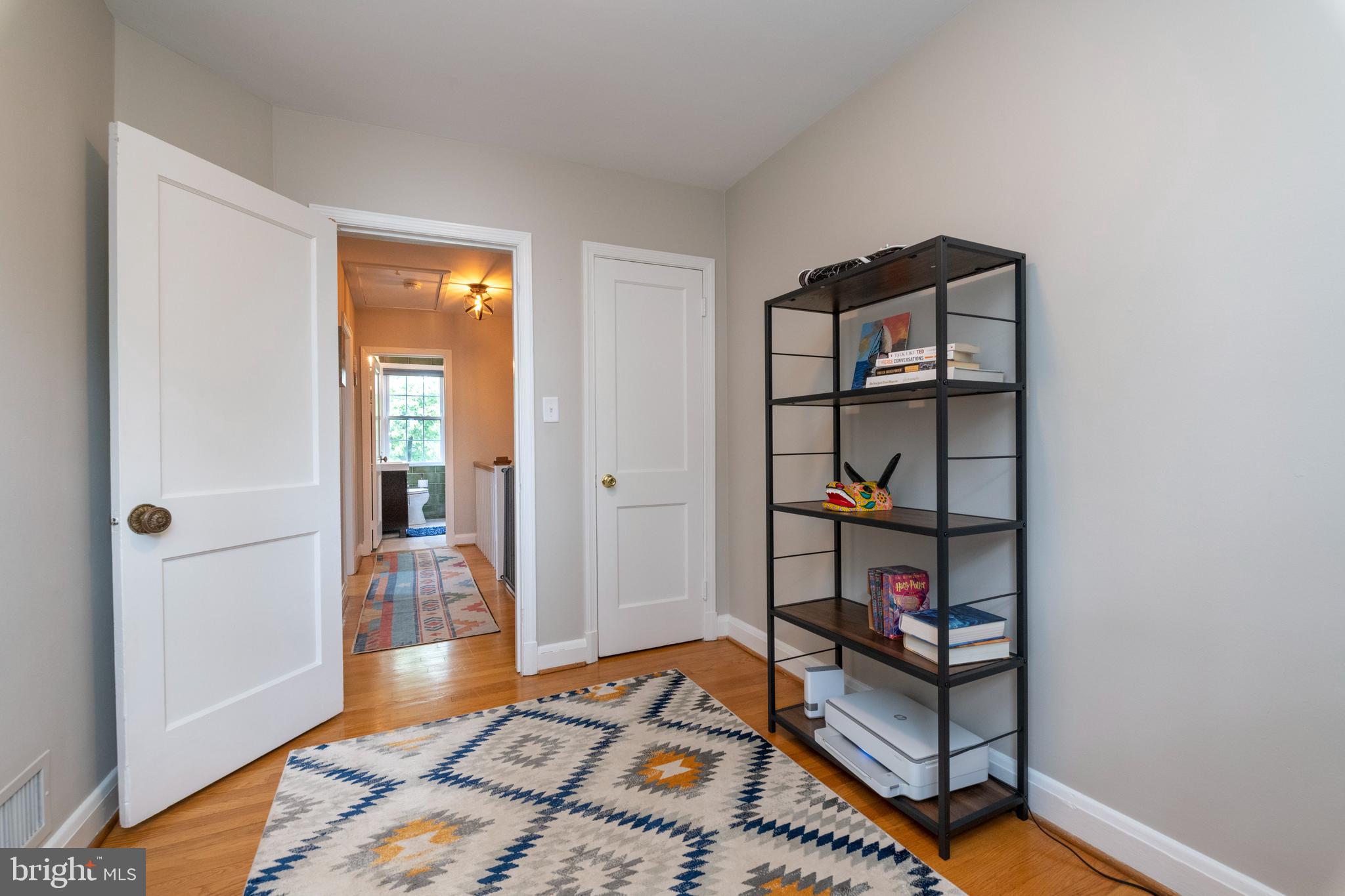 115 Brandon Road Baltimore, MD 21212 - Photo 25 of 39 a bedroom with a bed and a window