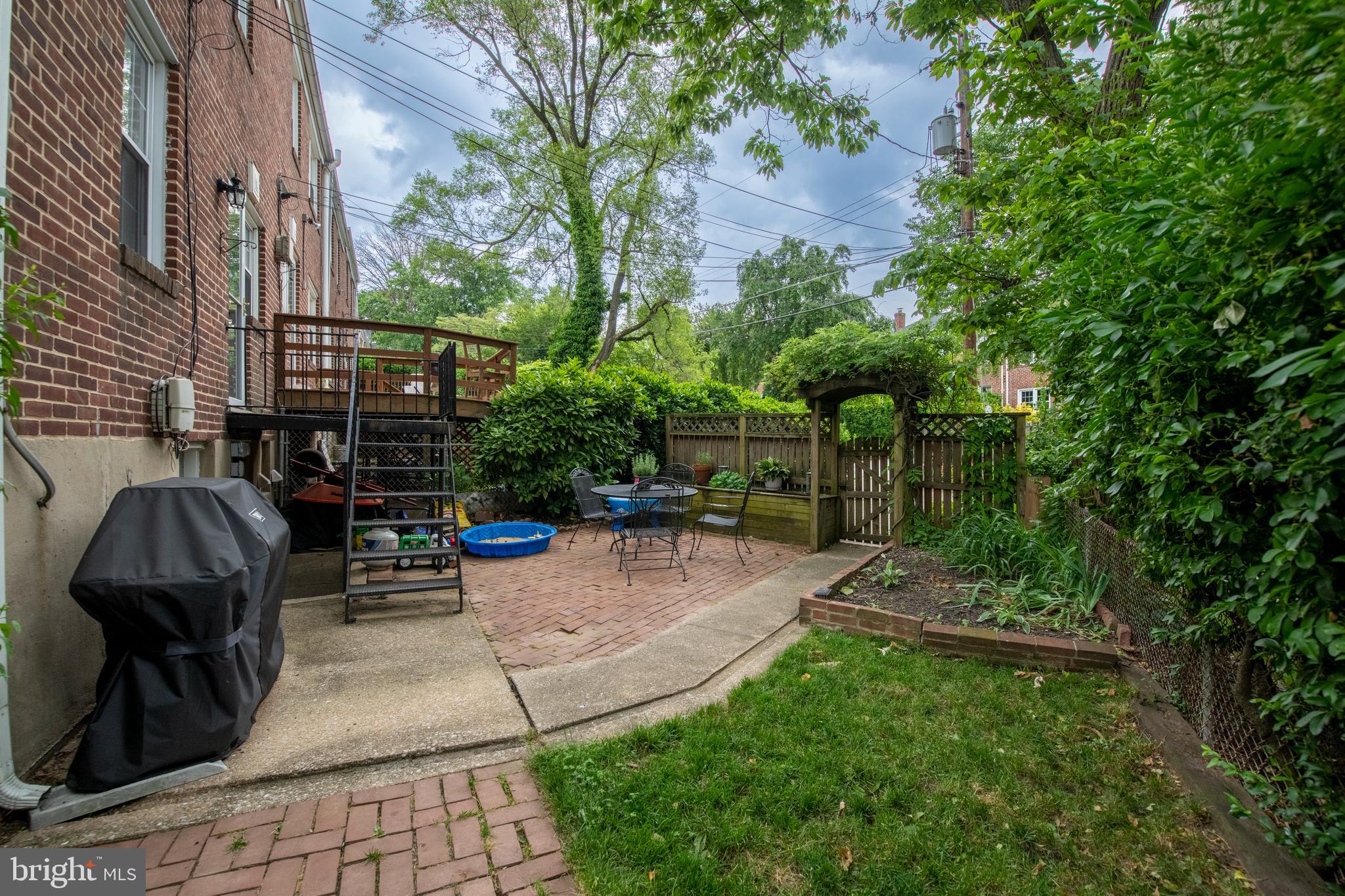 115 Brandon Road Baltimore, MD 21212 - Photo 34 of 39 a view of backyard with patio and outdoor seating