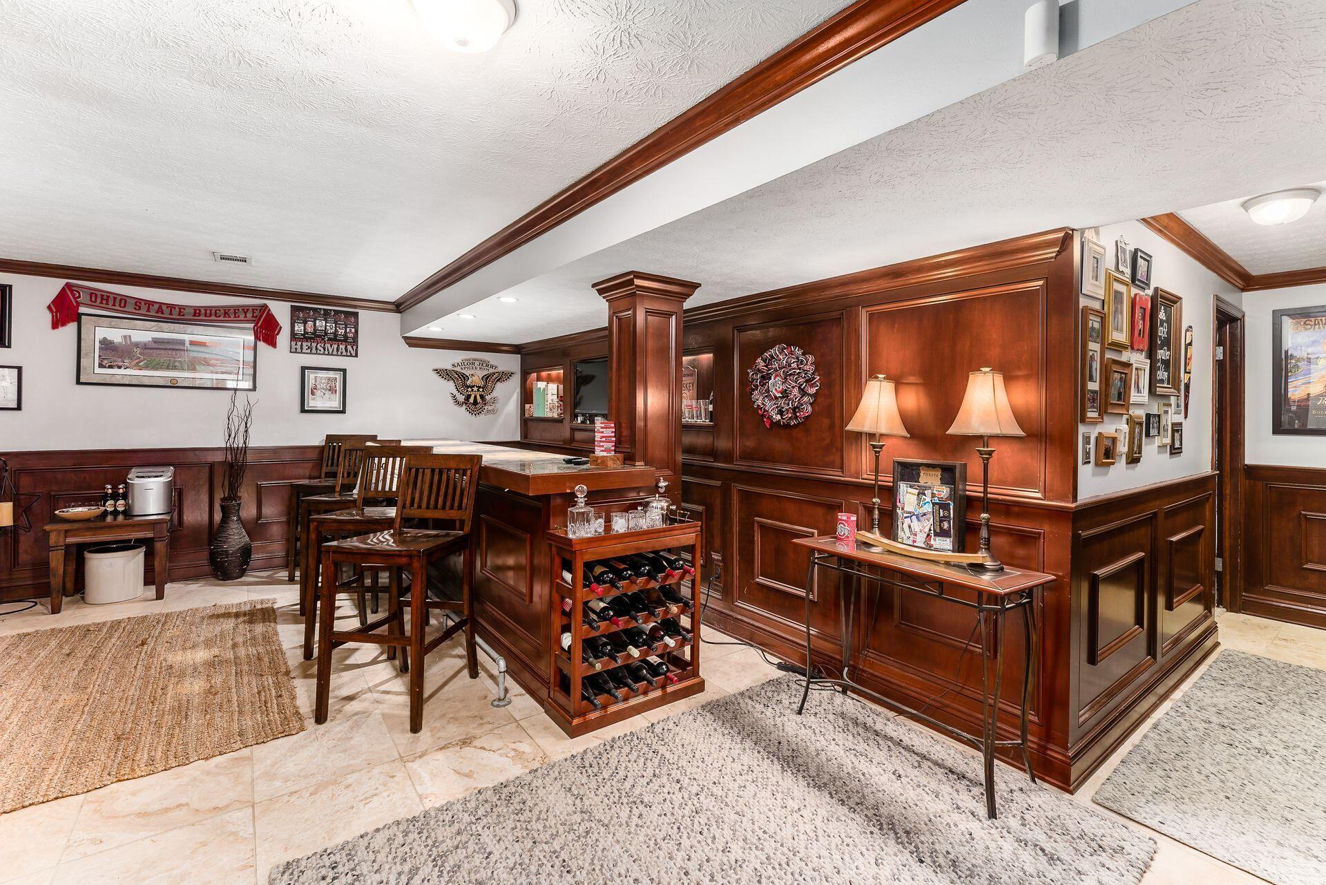 7080 Rieber Street Columbus, OH 43085 - Photo 27 of 55 Pub Style bar area in basement - ready for entertaining!