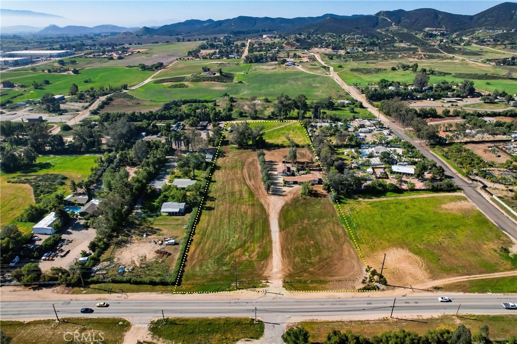 27355 Scott Road Menifee, CA 92584 - Photo 2 of 10 an aerial view of residential houses with outdoor space