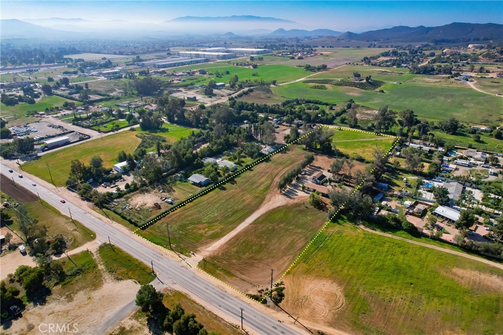 27355 Scott Road Menifee, CA 92584 - Photo 3 of 10 an aerial view of residential houses with outdoor space
