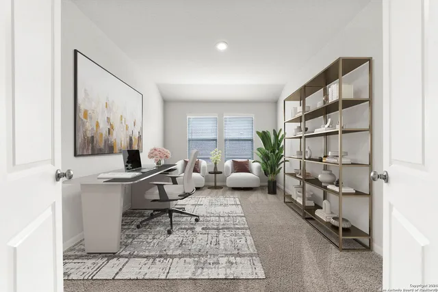 a living room with furniture a rug and a painting on the wall