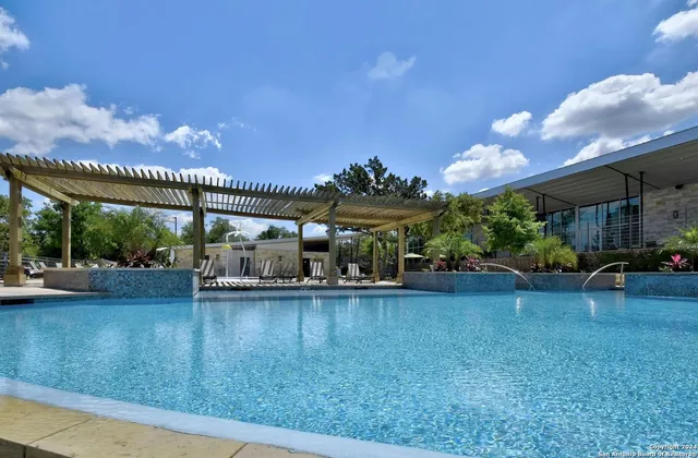 a view of a building with a yard