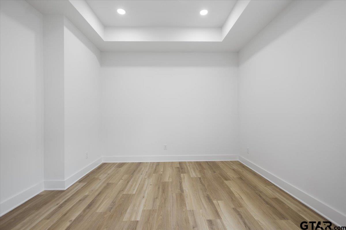 228 South Fenton Avenue Tyler, TX 75702 - Photo 27 of 46 a view of room with wooden floor