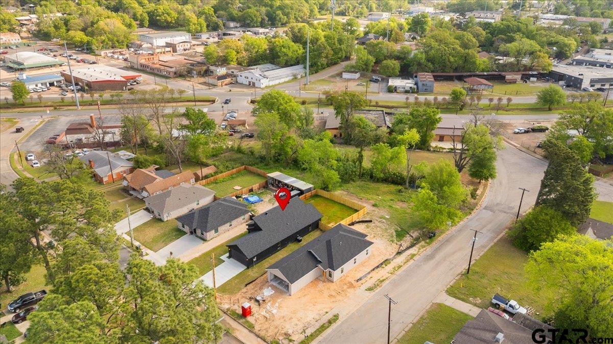 228 South Fenton Avenue Tyler, TX 75702 - Photo 43 of 46 an aerial view of residential houses with outdoor space