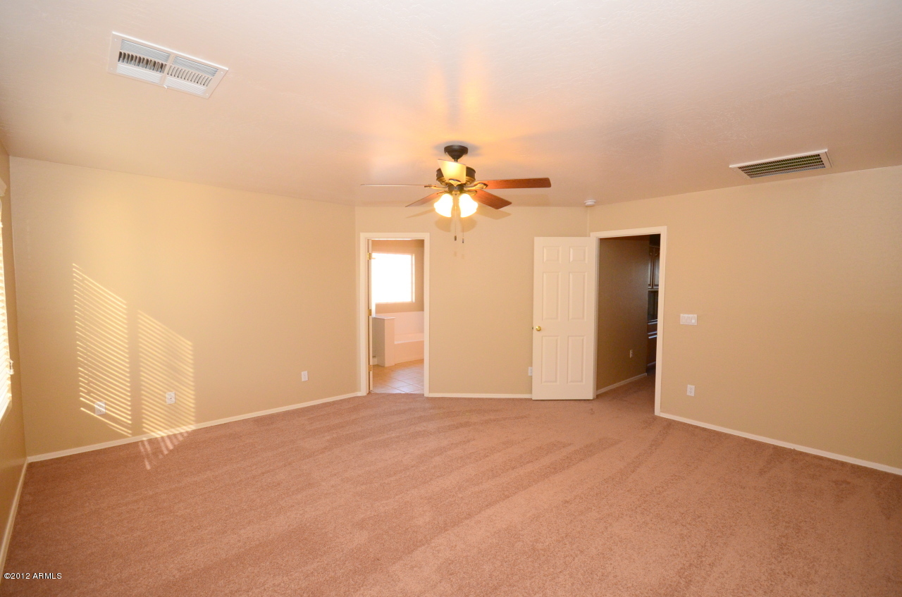 15629 West Redfield Road Surprise, AZ 85379 - Photo 13 of 24 Master Bedroom2