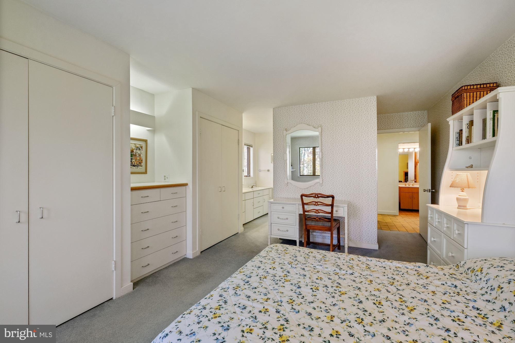 23212 Peach Tree Road Clarksburg, MD 20871 - Photo 19 of 52 First floor bedroom with built ins