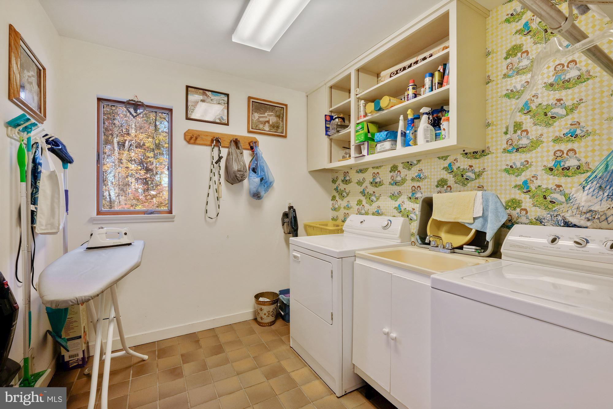 23212 Peach Tree Road Clarksburg, MD 20871 - Photo 21 of 52 First floor laundry room