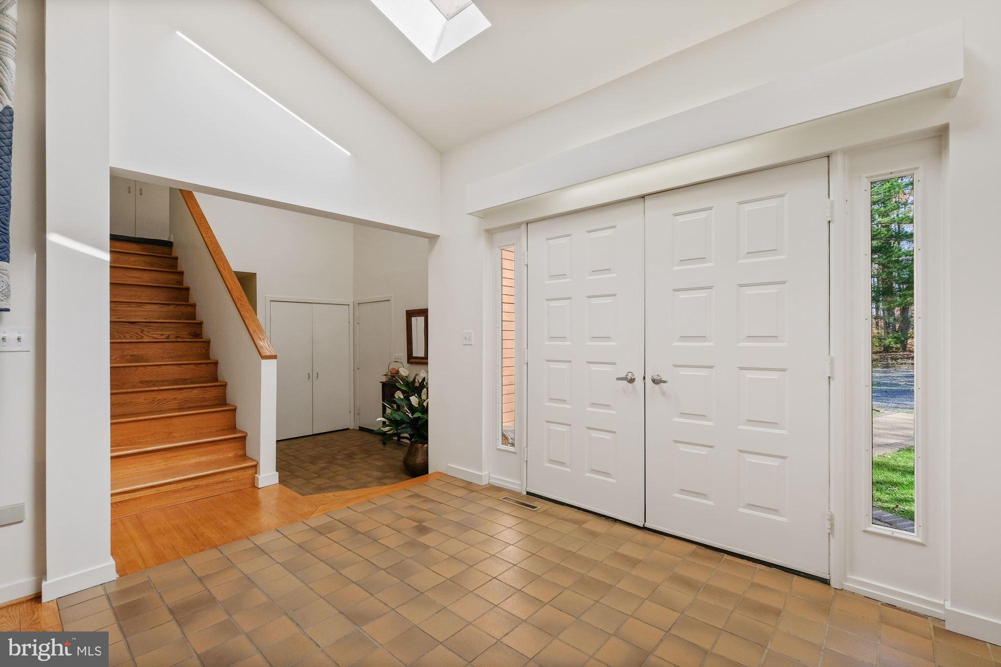 23212 Peach Tree Road Clarksburg, MD 20871 - Photo 22 of 52 Foyer and staircase to second level