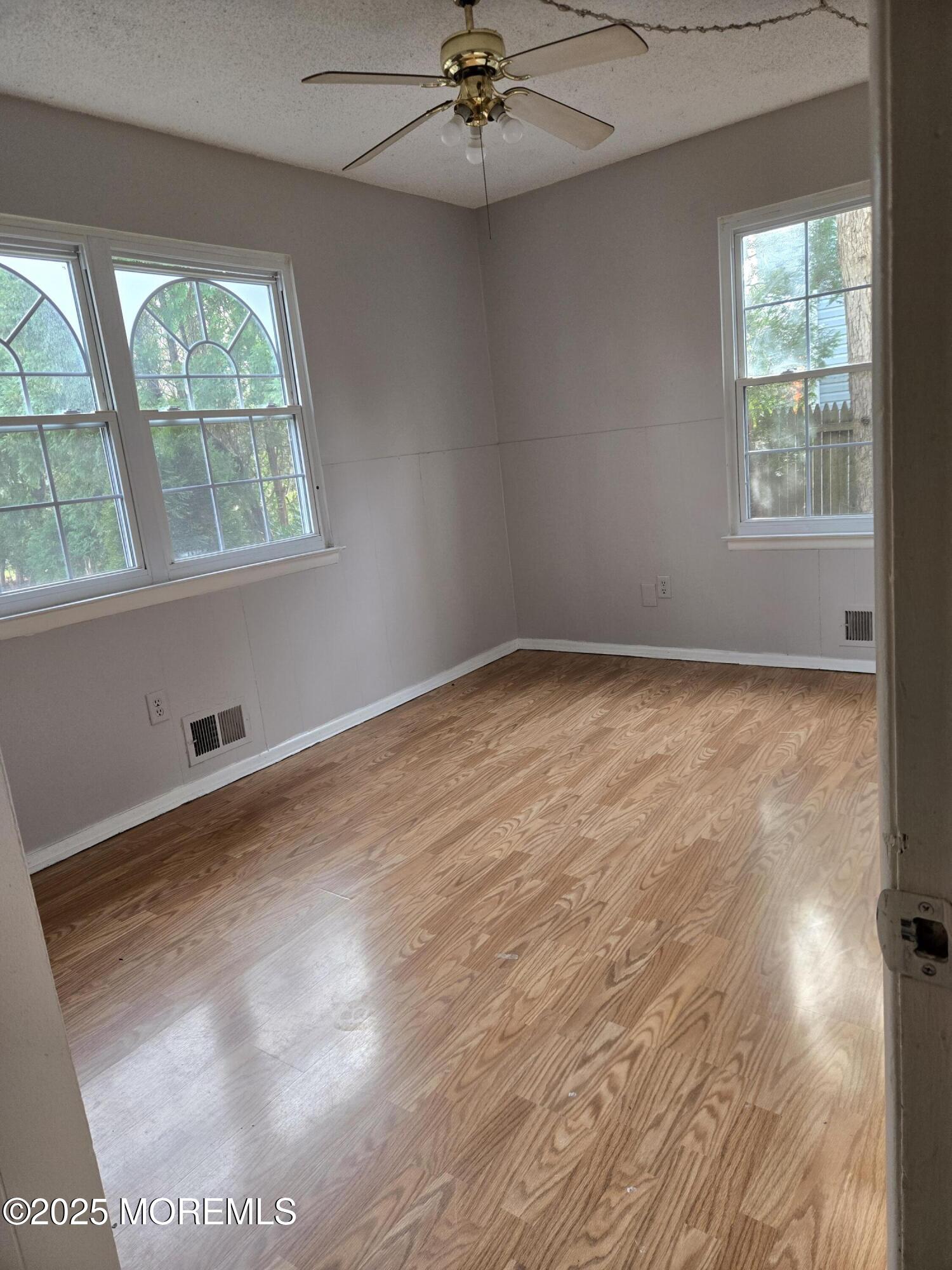 802 Miller Avenue Jackson, NJ 08527 - Photo 4 of 20 an empty room with a window