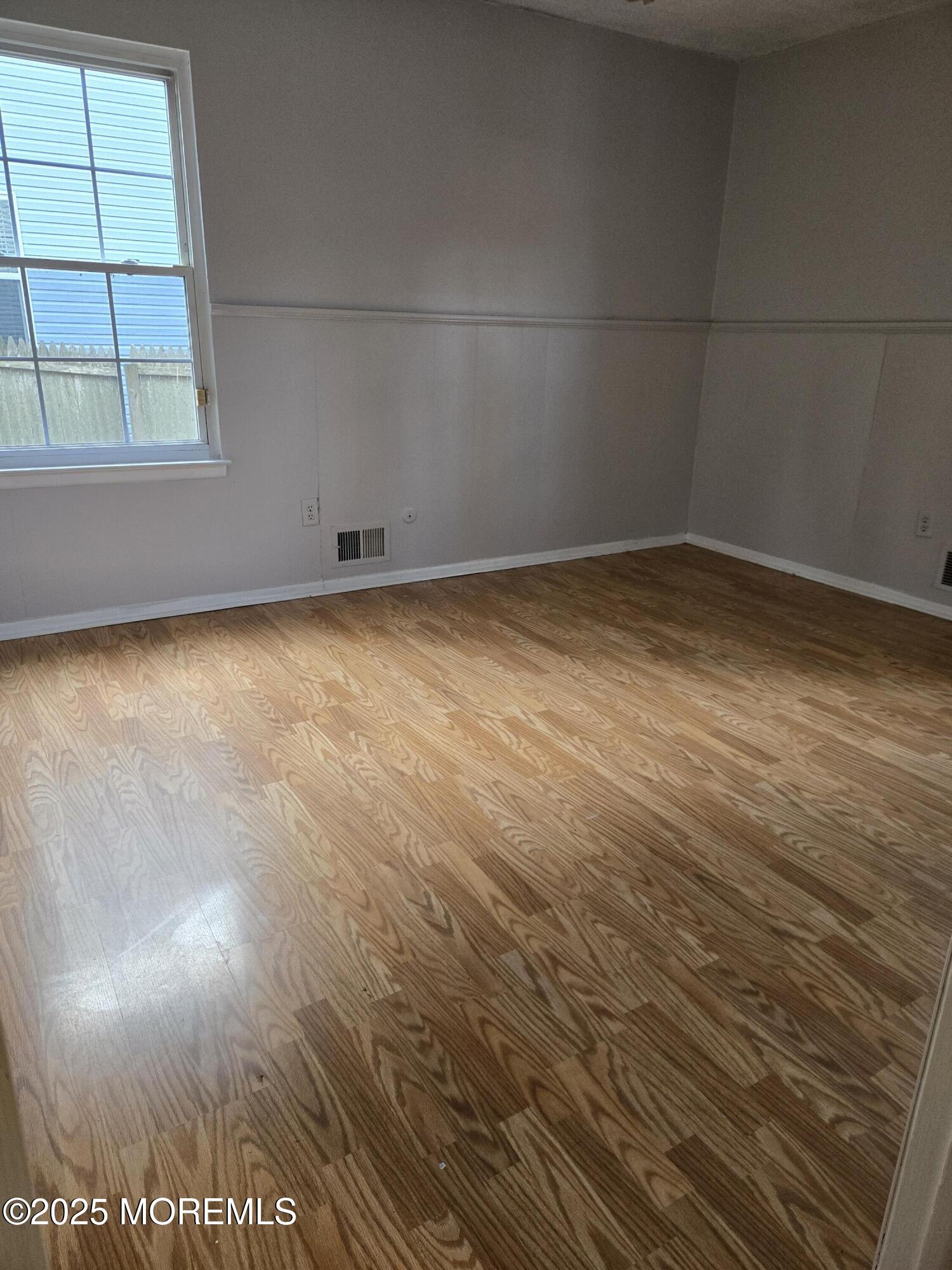 802 Miller Avenue Jackson, NJ 08527 - Photo 5 of 20 an empty room with a window