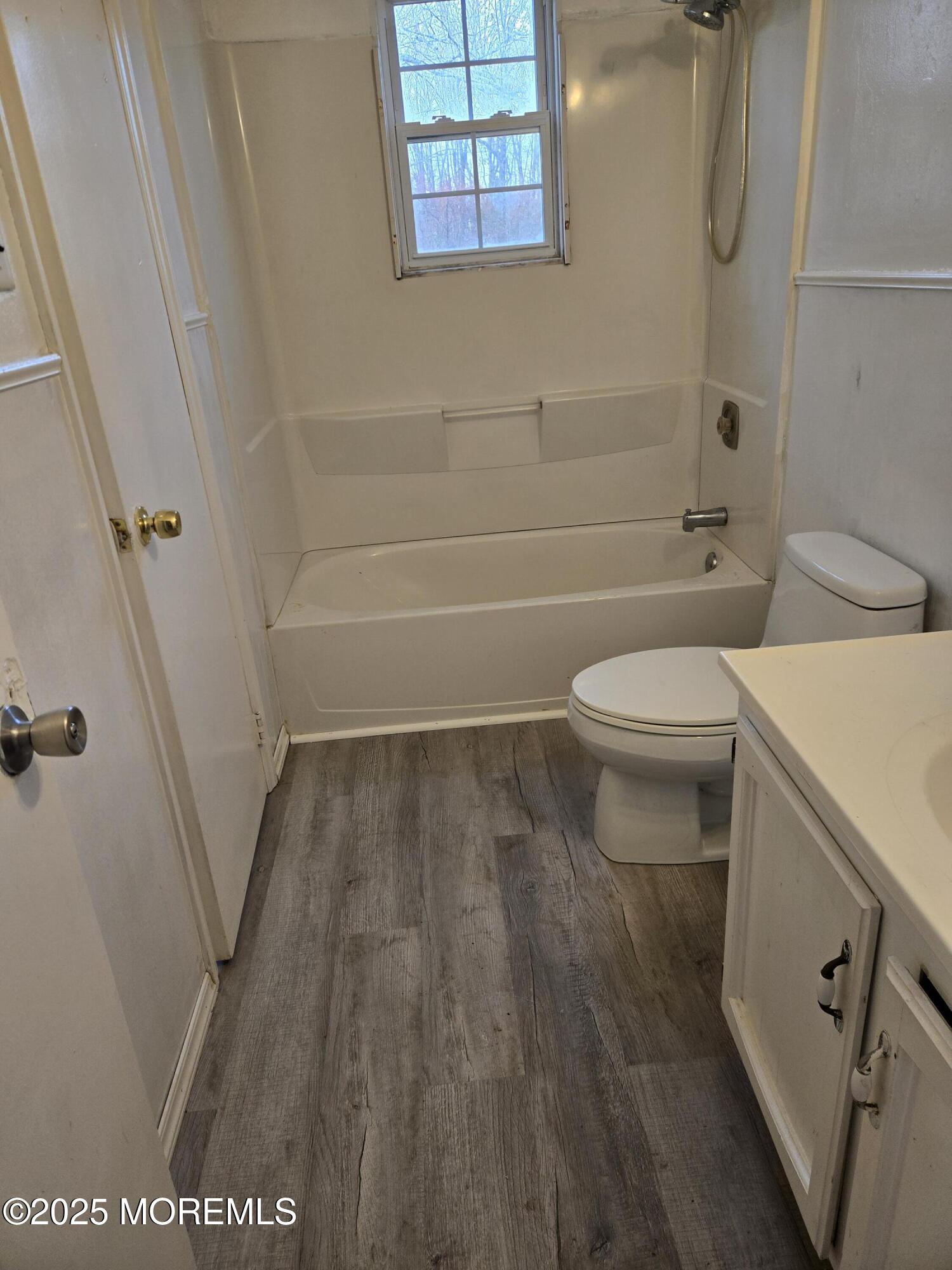 802 Miller Avenue Jackson, NJ 08527 - Photo 6 of 20 a bathroom with a toilet and a shower