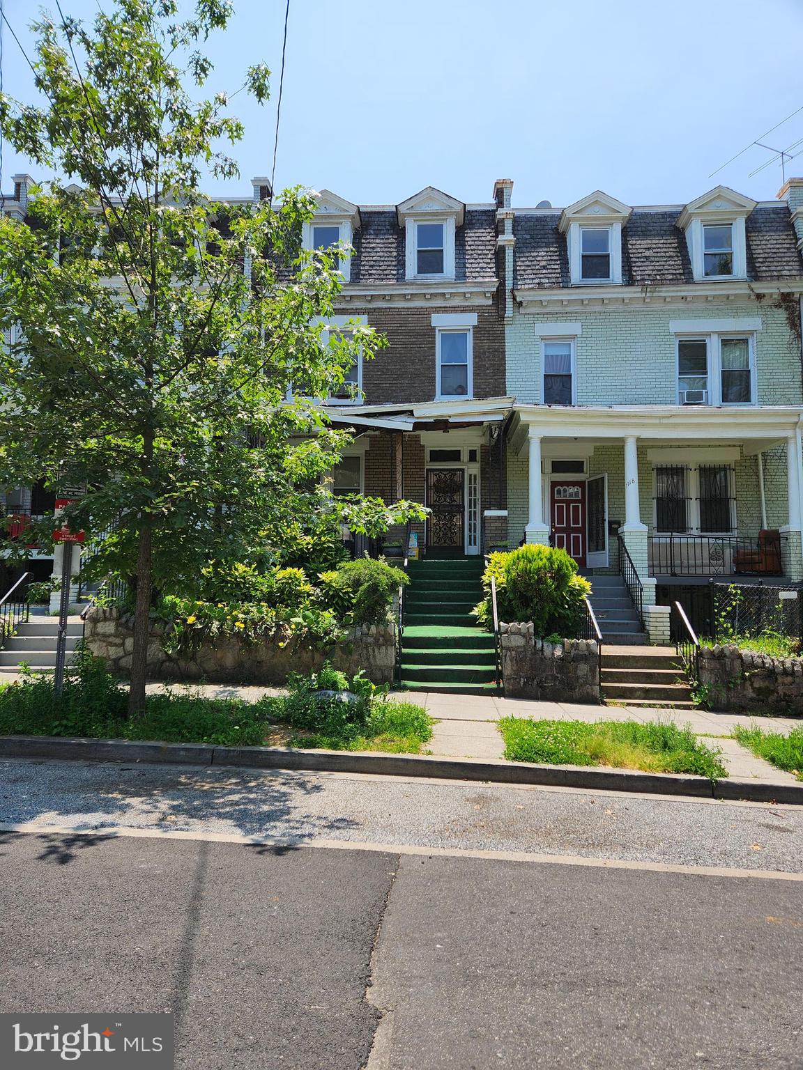 1116 Allison Street Northwest Washington, DC 20011 - Photo 1 of 41 front view of a house with a yard