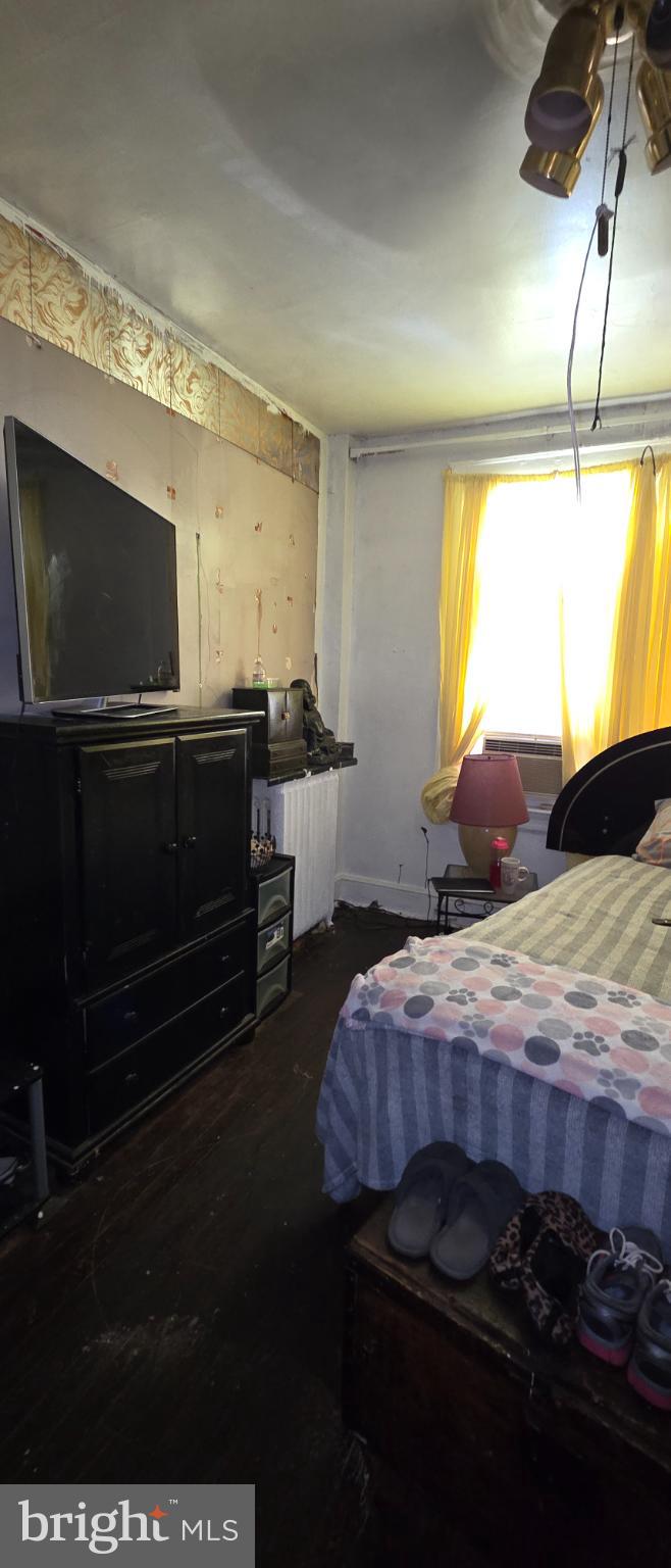 1116 Allison Street Northwest Washington, DC 20011 - Photo 21 of 41 a bedroom with bed and window