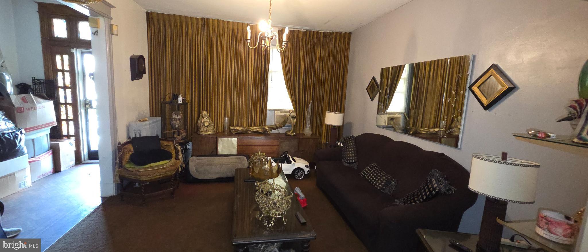 1116 Allison Street Northwest Washington, DC 20011 - Photo 24 of 41 a living room with furniture and a large window